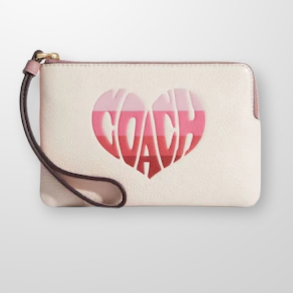 Coach Handbags - COACH Corner Zip Wristlet With Stripe Heart Motif